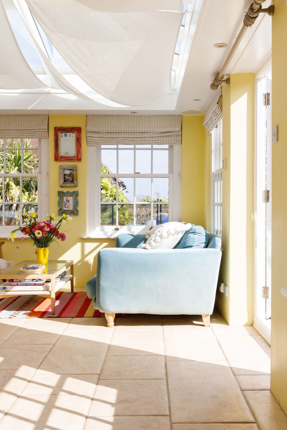 The sunny orangery lets plenty of natural light flood in.