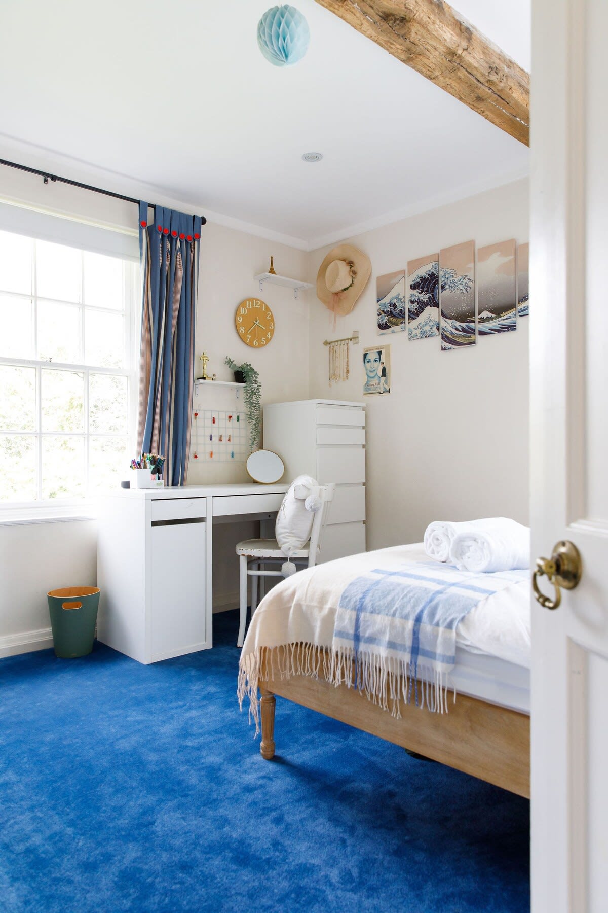 Another double rooms, with large sash windows and exposed beams.