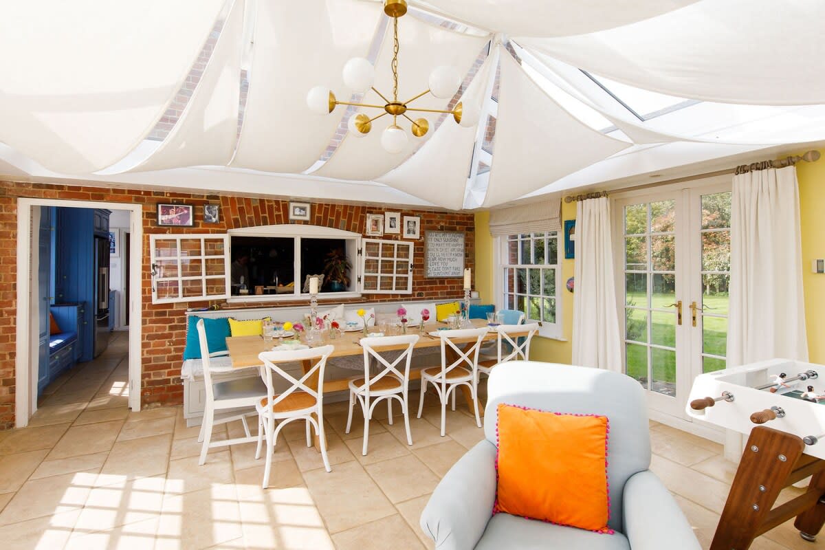 The dining table comfortably seats 10 guests.