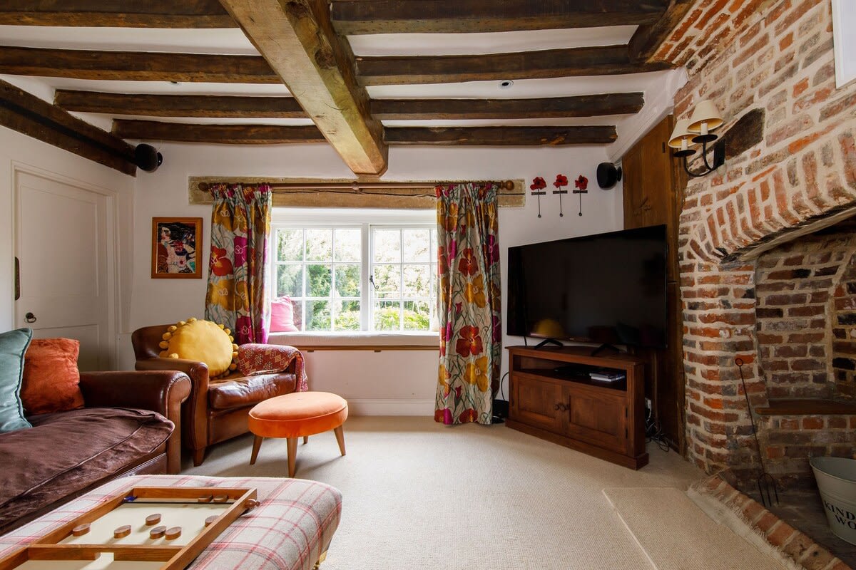 The snug lounge with Smart TV is perfect for film evenings or for children to have some downtime.