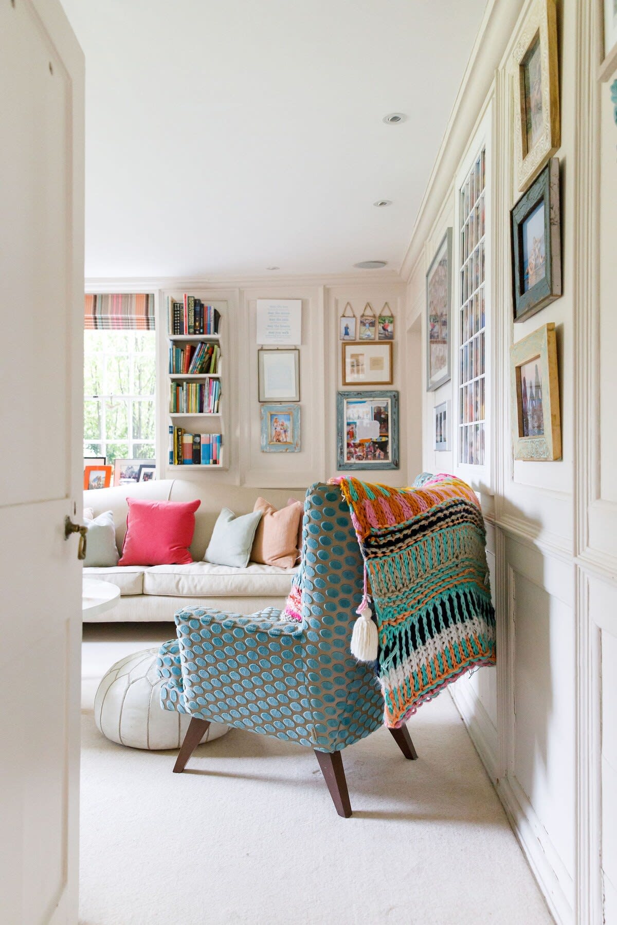 The drawing room is colourful and light, with cosy throws and comfy cushions.