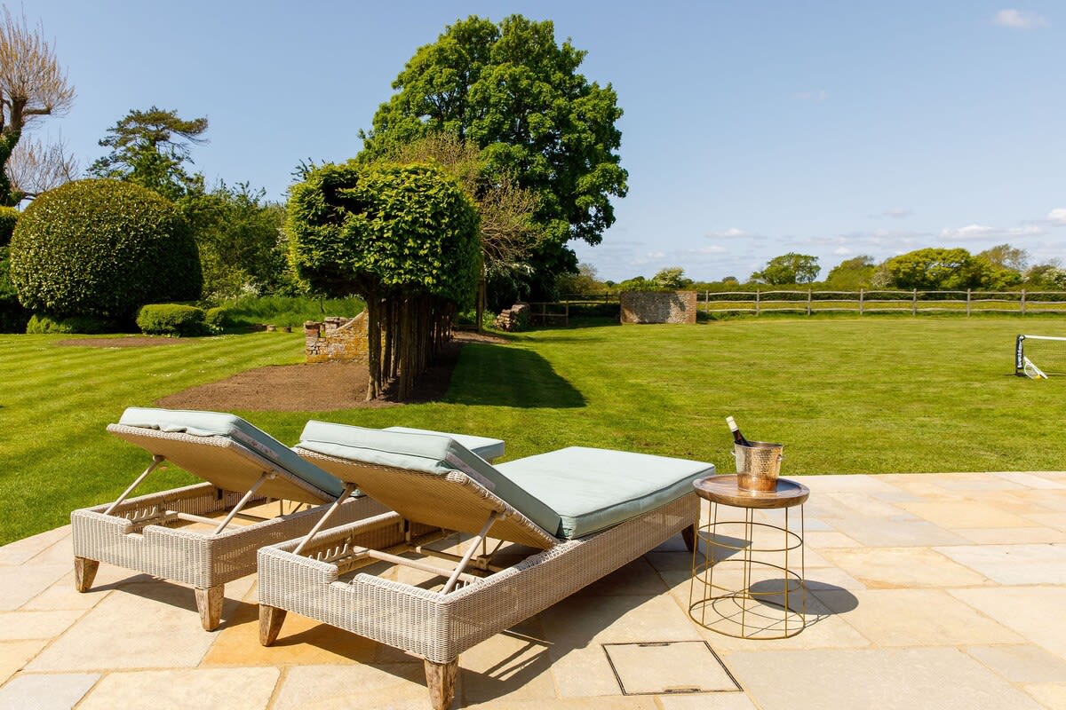 Recline on the sun loungers with a glass of fizz! Luxury awaits!