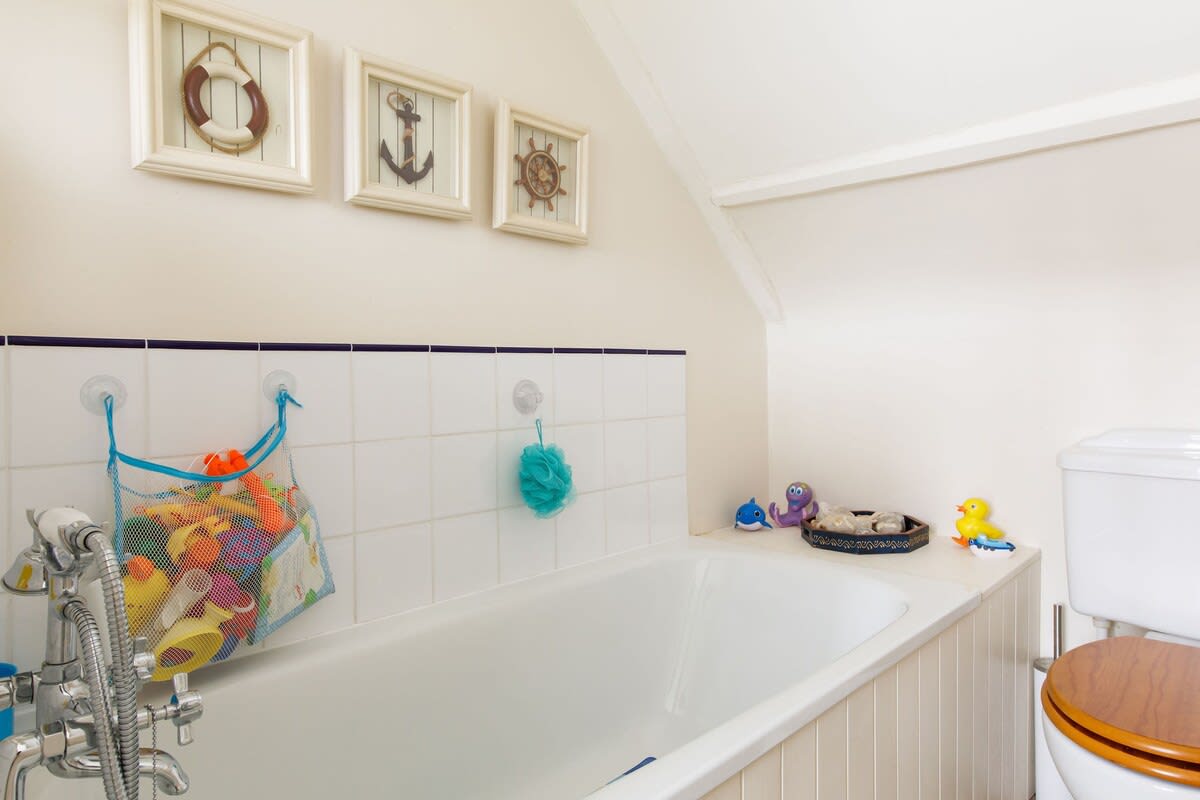 There is a handy bathoom between the children's rooms.