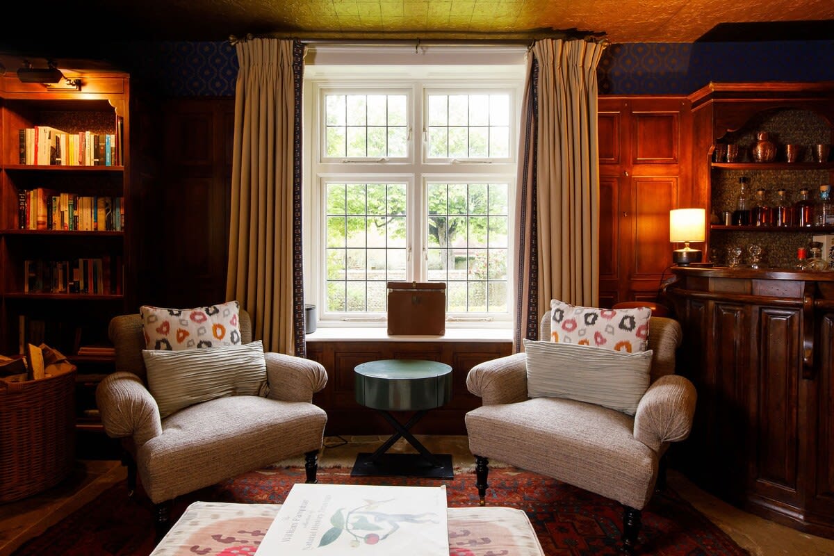 The wood panelled study oozes sophistication.