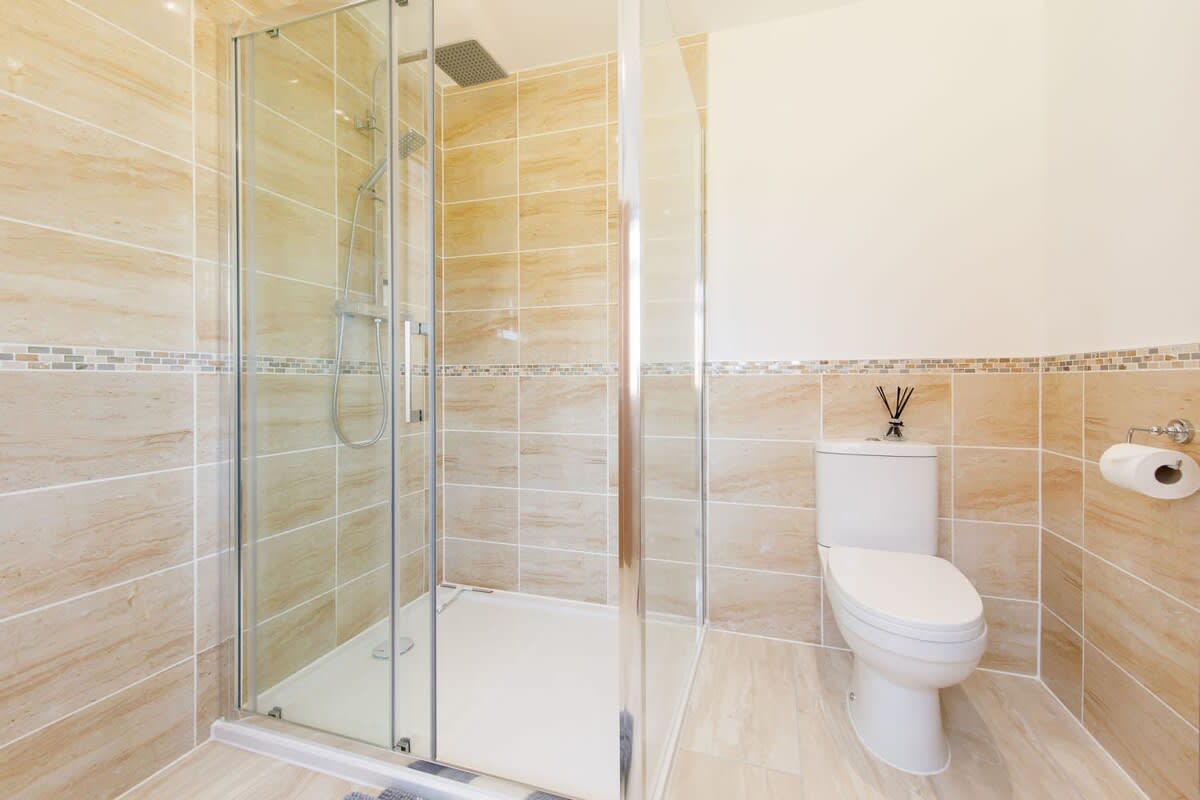 A large overhead shower for your use.