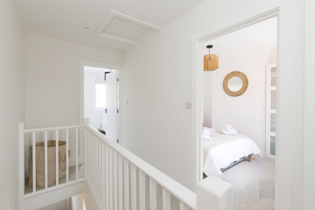 The house has two minimalistic but homely bedrooms upstairs to sleep up to 4 guests.