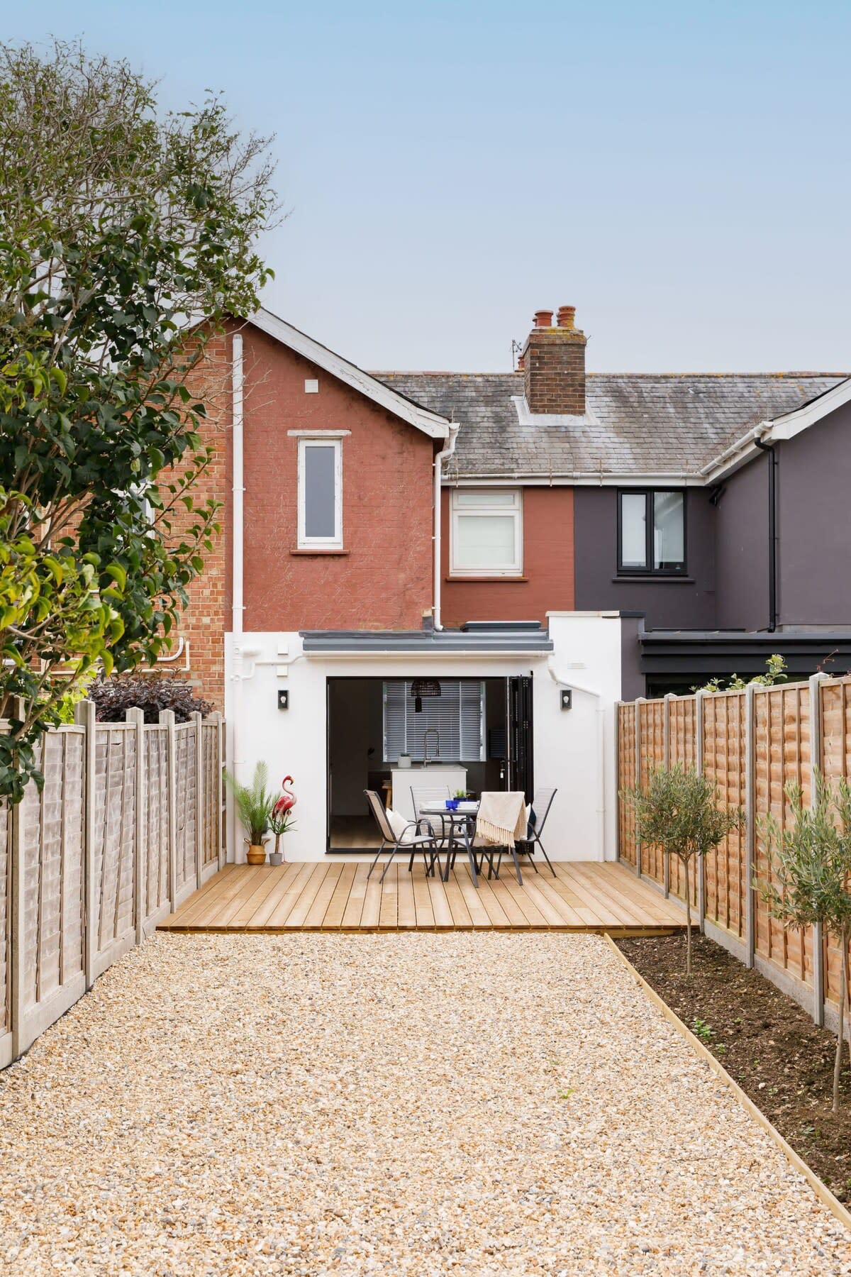 Open up the bi-fold door and head out from the kitchen to a perfectly manicured outside space.