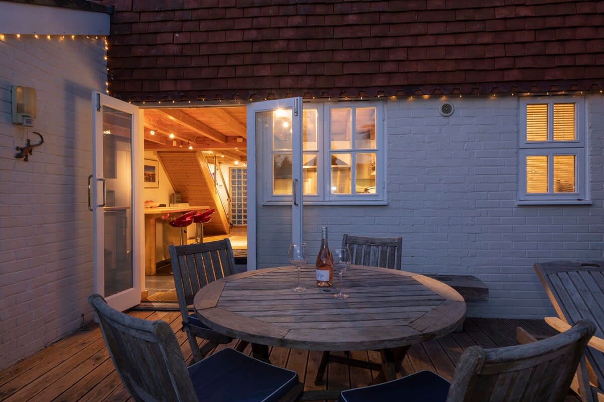 The patio doors open up from the kitchen into the garden.