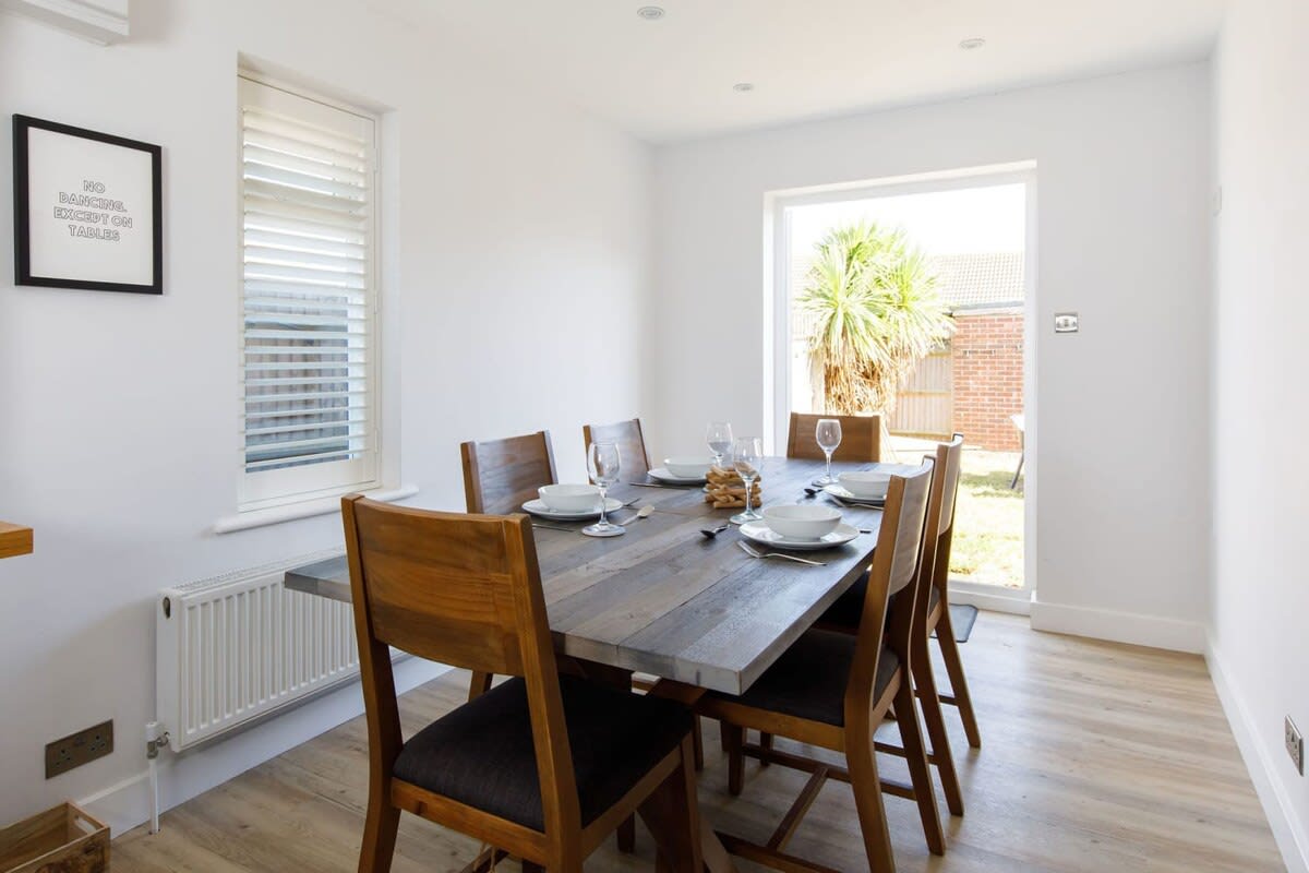 Connected to the kitchen is a lovely dining space to enjoy leisurely meals and time with loved ones.