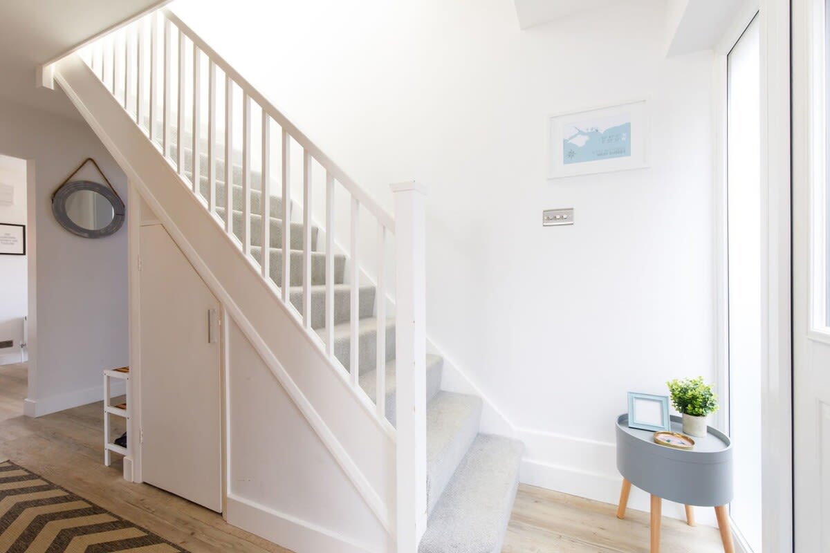 As you enter there is a bright and airy entrance hall.