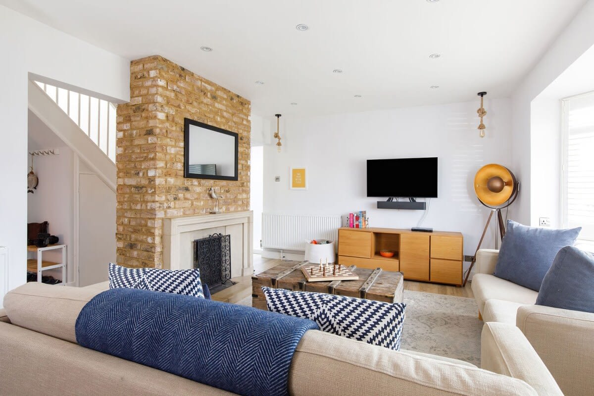 The living room has comfy sofas, an open fire and a Smart TV for family evenings watching a film or favourite show.