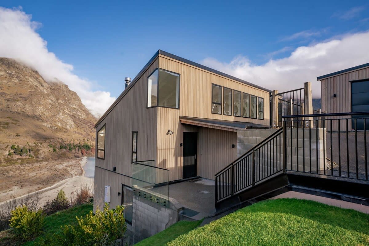 Riverfront Chateau with Stunning Mountain Views
