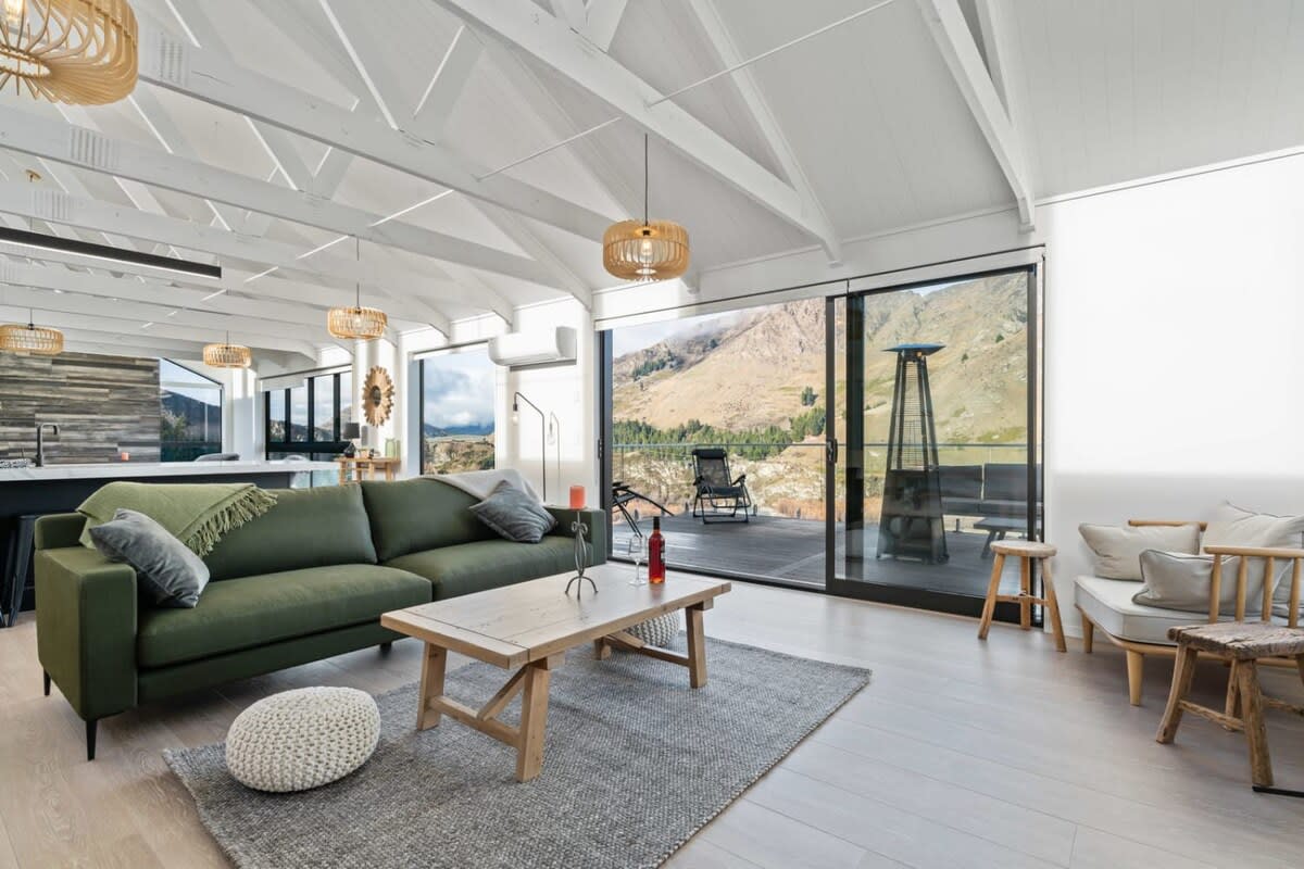Riverfront Chateau with Stunning Mountain Views