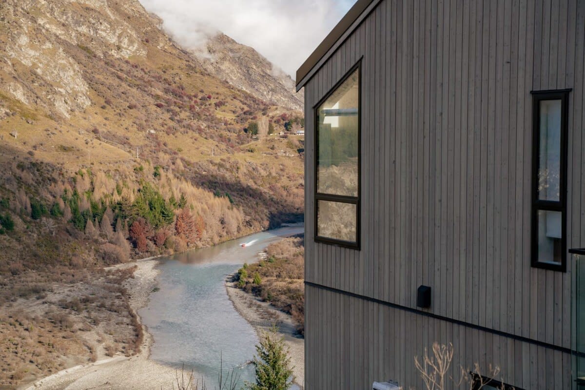 Riverfront Chateau with Stunning Mountain Views