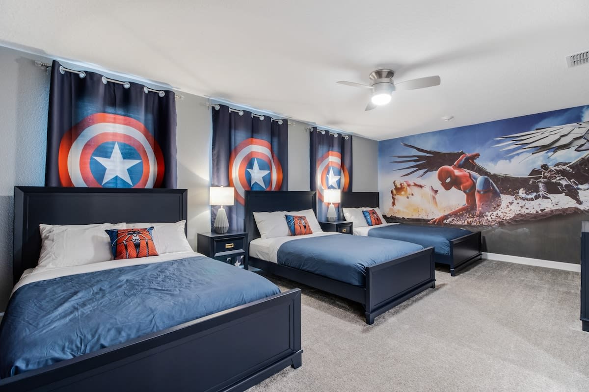 Immerse yourself in a superhero adventure with themed decor and cozy beds, perfect for fans of all ages!