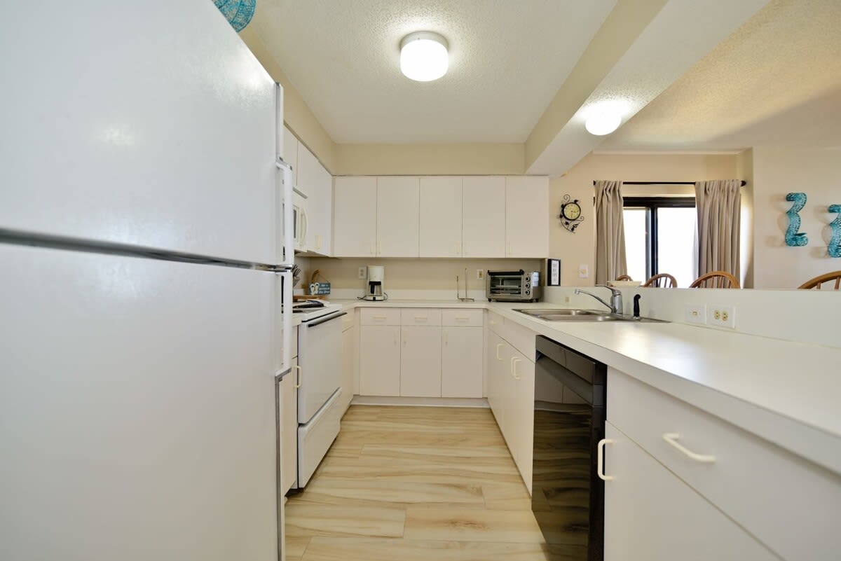 Kitchen Equipped with Keurig and Microwave Oven