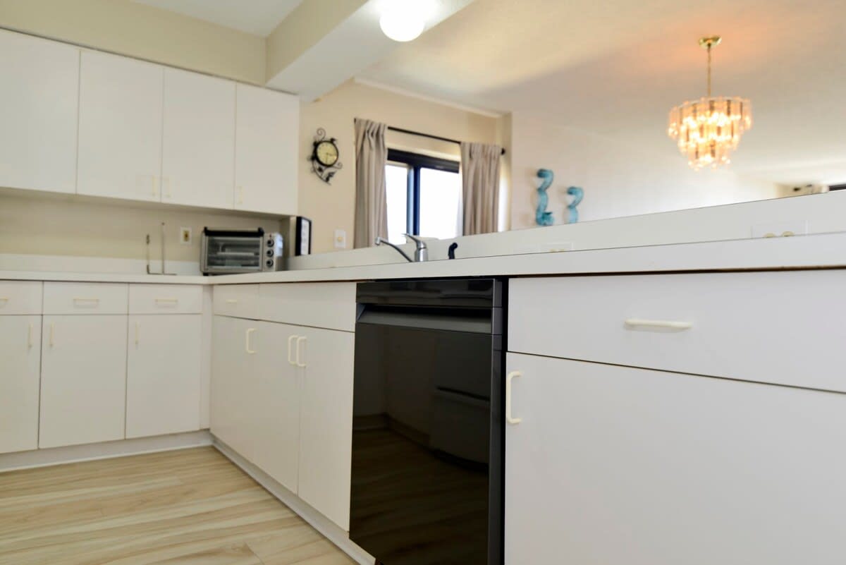 Kitchen Equipped with Keurig and Microwave Oven