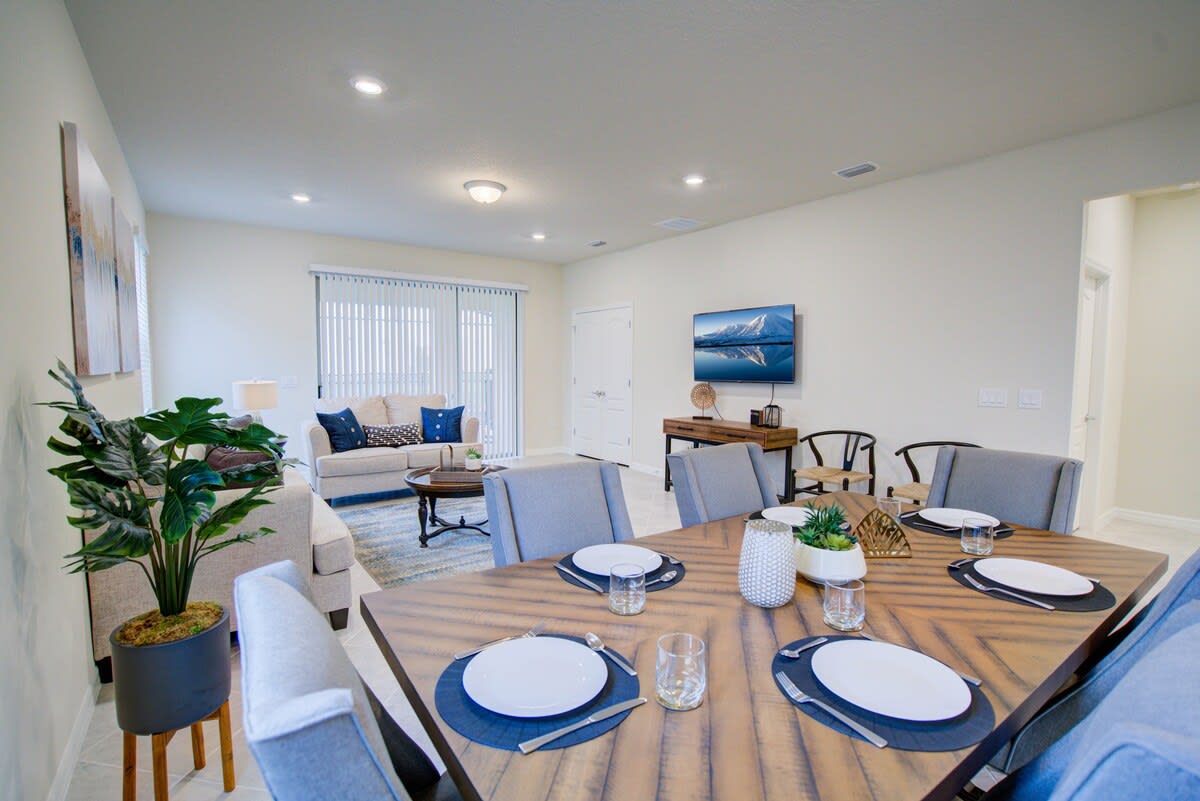 Spacious and inviting living area with modern decor, perfect for relaxing or entertaining.