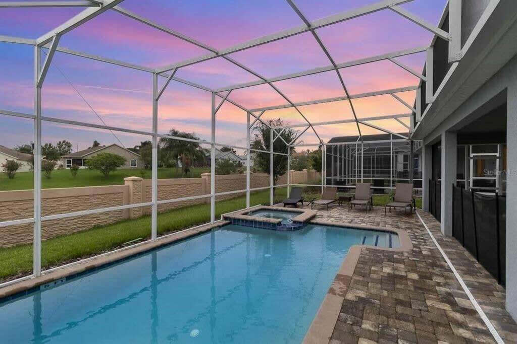 Relax in your private pool and spa while enjoying breathtaking sunset views, perfect for unwinding and entertaining guests.