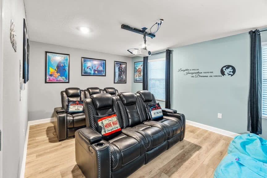 Relax in your private home theater with plush recliners and a top-notch projector for unforgettable movie nights.