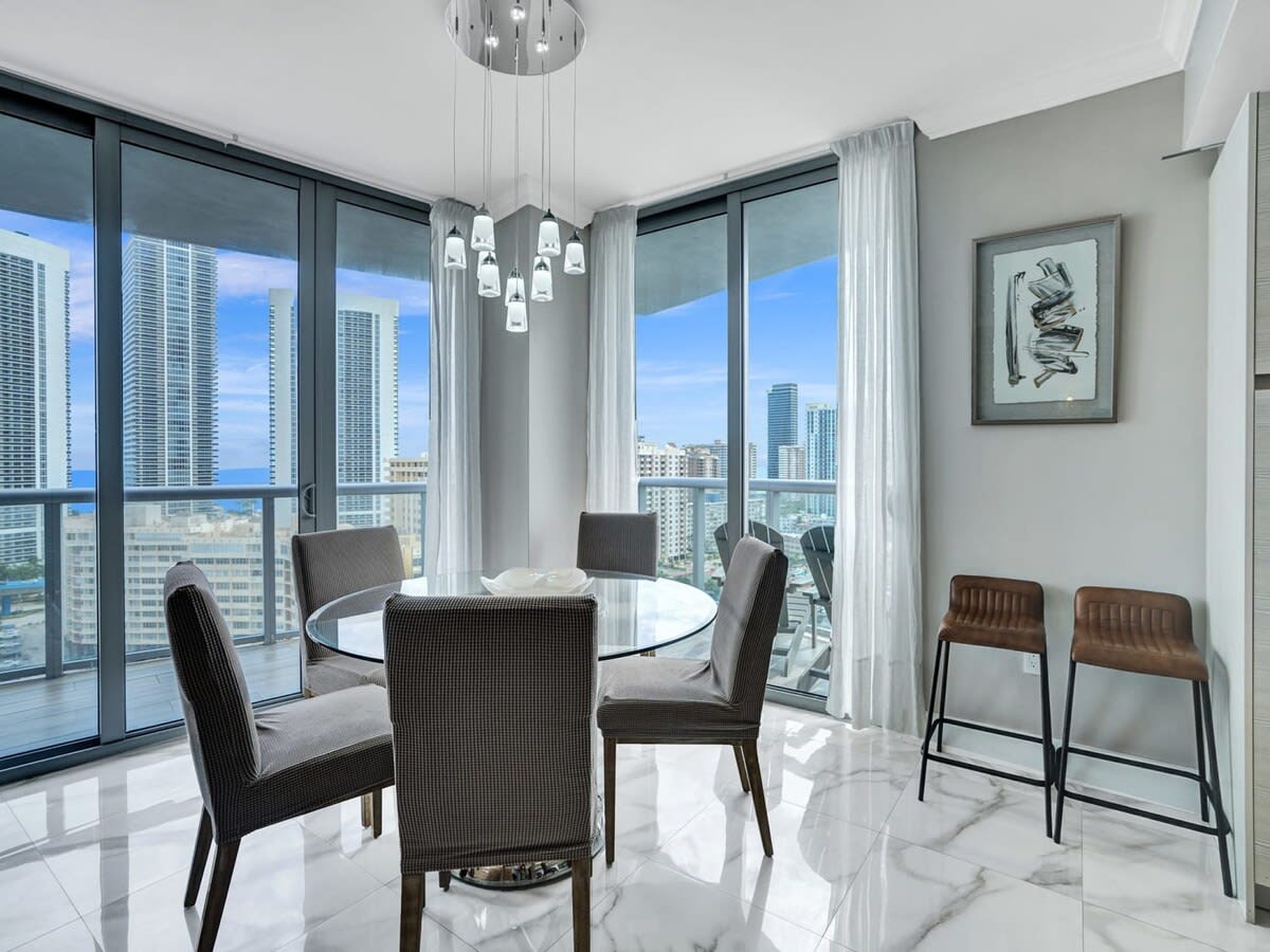 Dine in Style: Enjoy delicious meals in our elegant dining area with a view