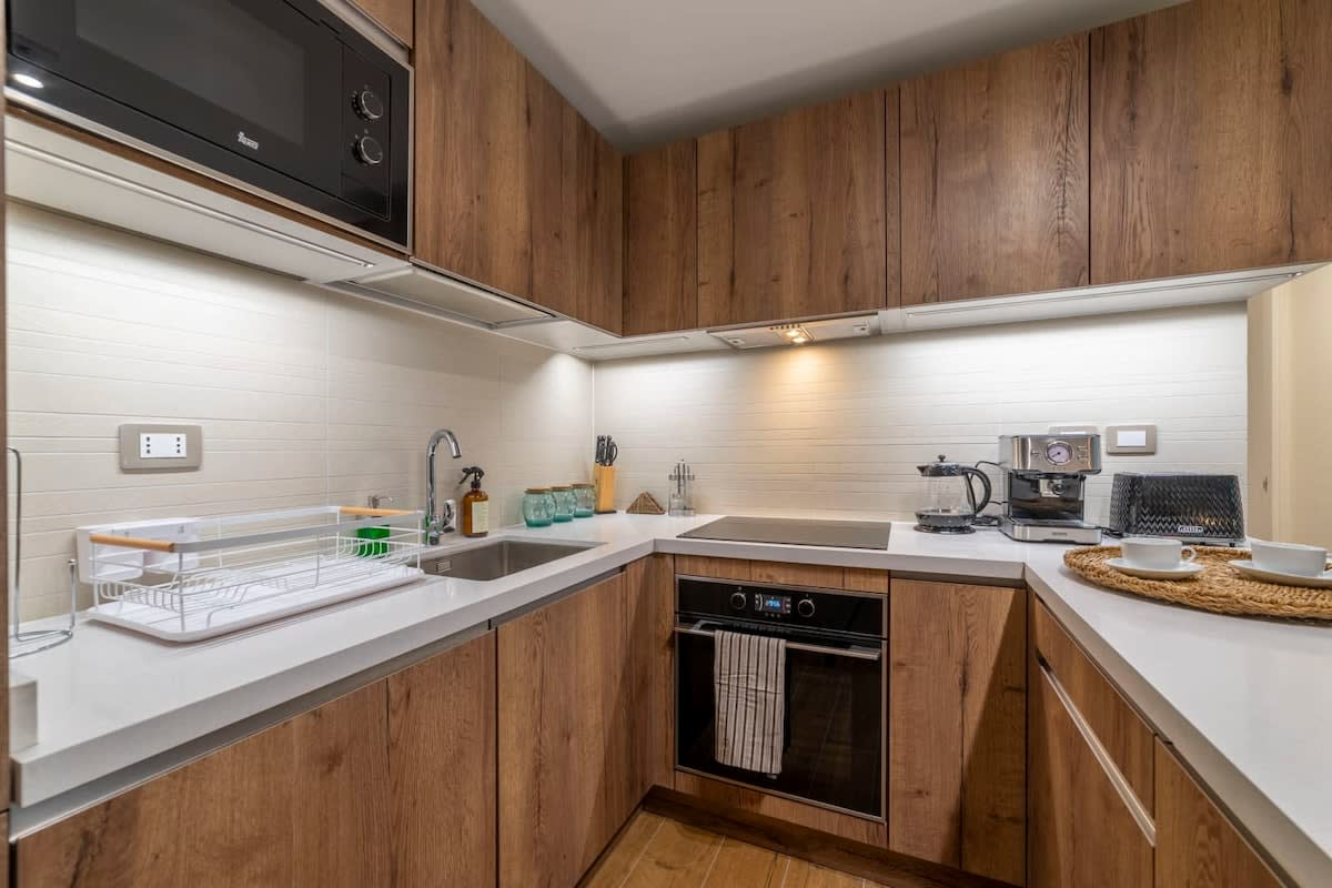 Sleek and modern kitchen with all the essentials for a cozy stay in the heart of Chile.