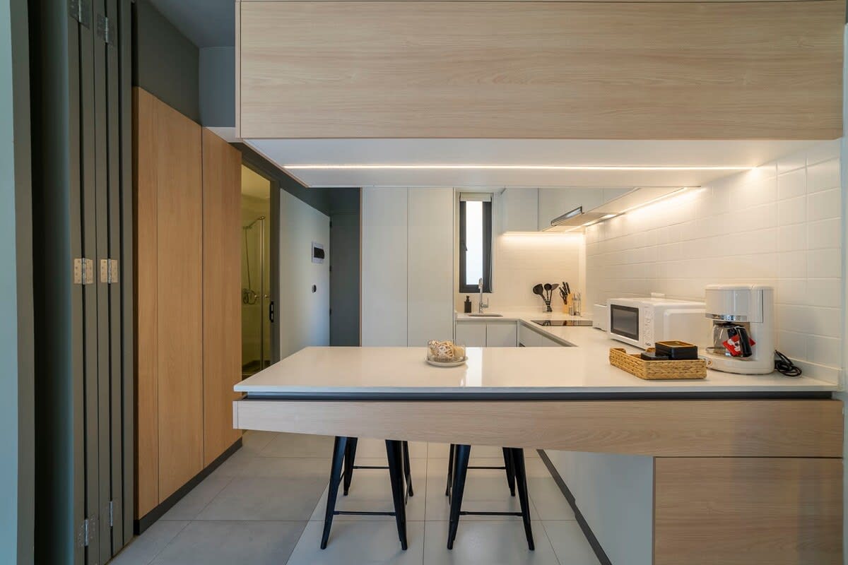 Sleek and modern kitchen with all essentials for a comfortable stay in the heart of Chile.