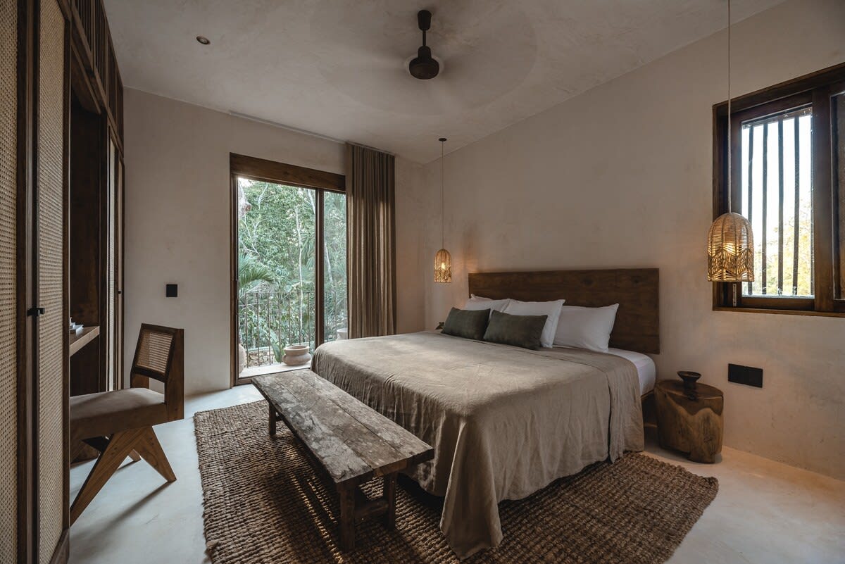 Bedroom three, with balcony access and dedicated workspace