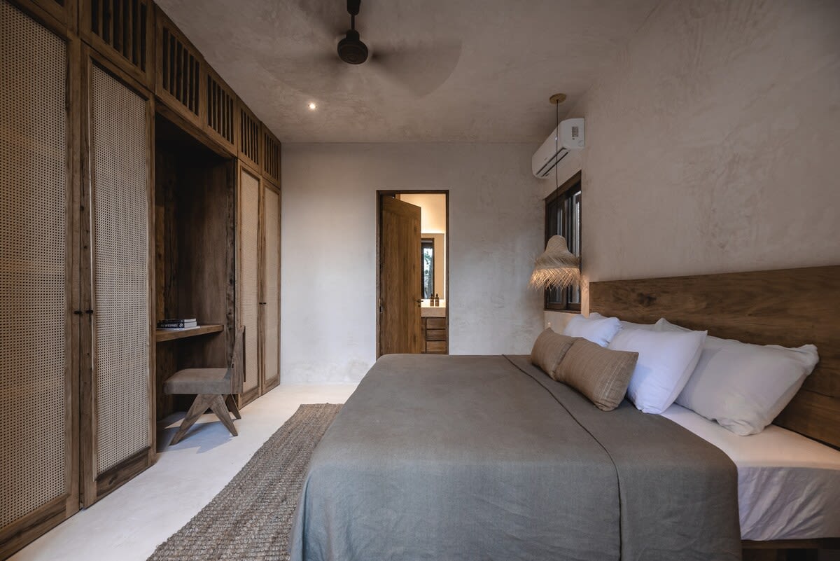 Main floor bedroom, with ensuite bathroom and direct garden access