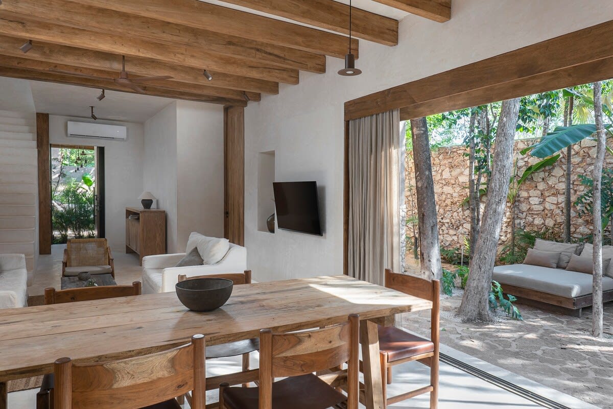 Living room located on the lower floor with access to the private patio.