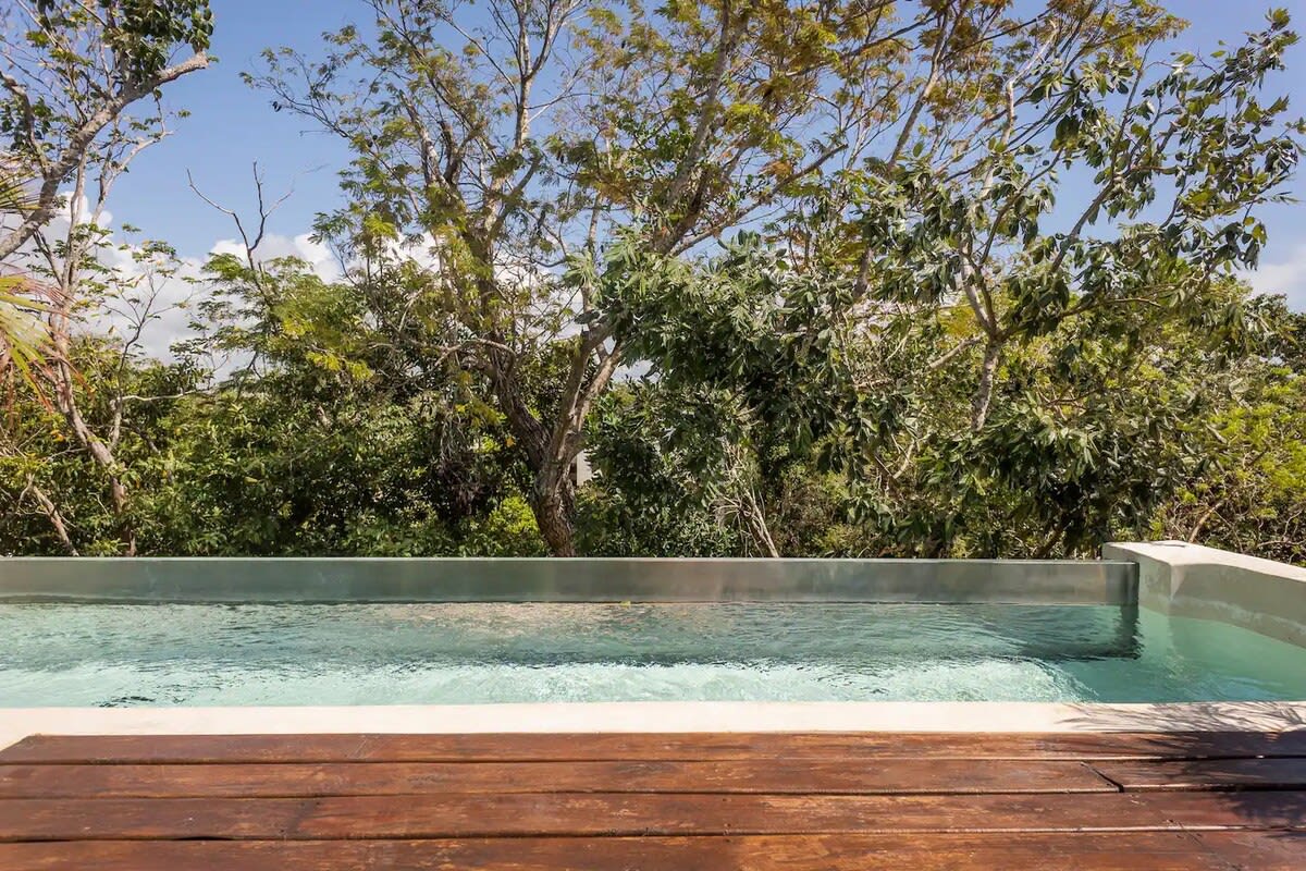 Rooftop dipping pool, engulfed with sunlight