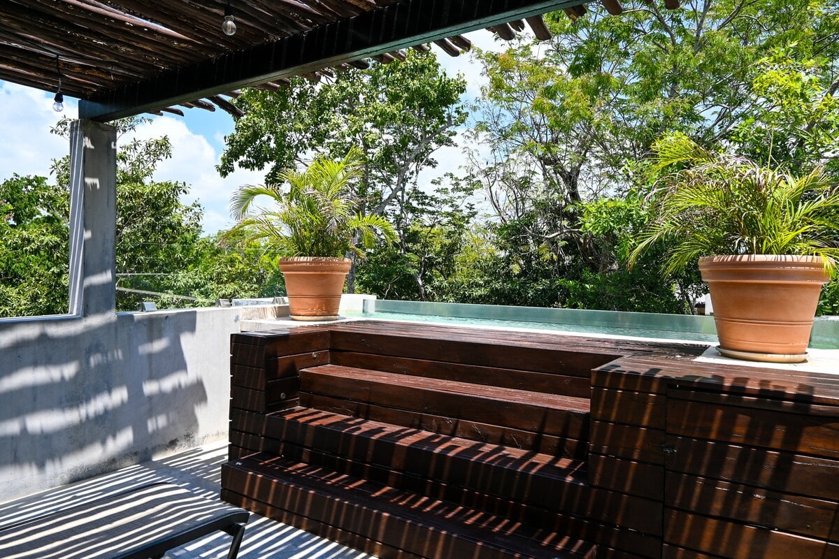 Private rooftop dipping pool, with sun loungers and outdoor dining
