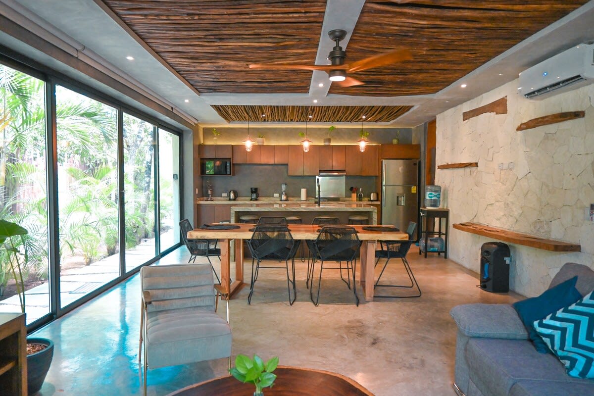 Dining room, kitchen, and living area integrated on the ground floor