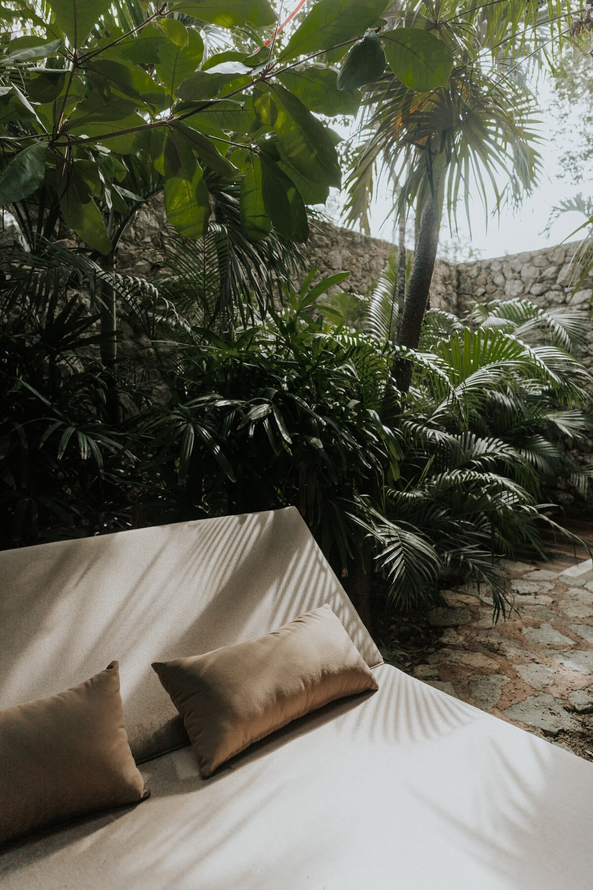 Beautiful lounger surrounded by vegetation.