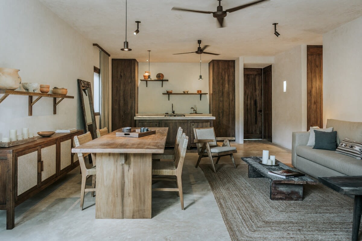 Elegant and rustic ground floor of the property. Living room, dining room, and kitchen integrated into one space.