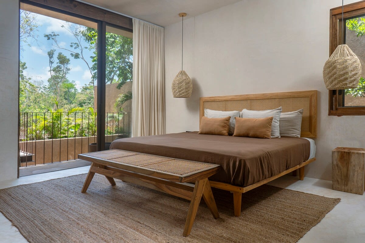 Spacious room with a king-size bed and exterior view.