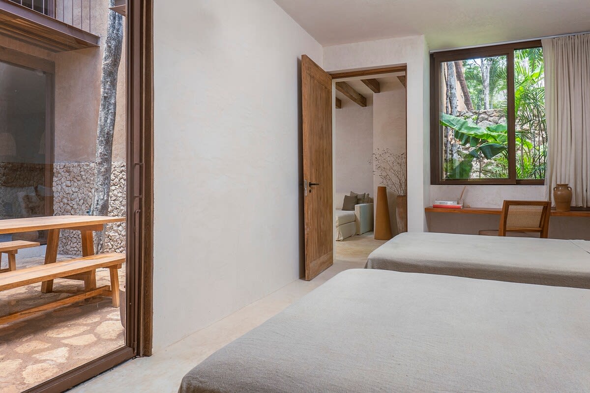 Bedroom #1 has two double beds and an ensuite bathroom.