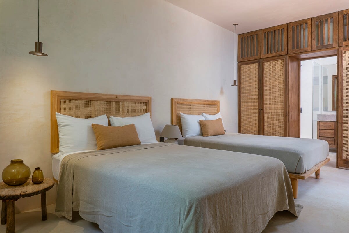 Bedroom #1 has two double beds and an ensuite bathroom.