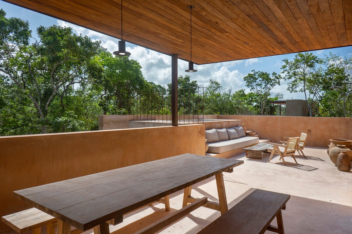 Private terrace with a dining area, living area, and plunge pool.