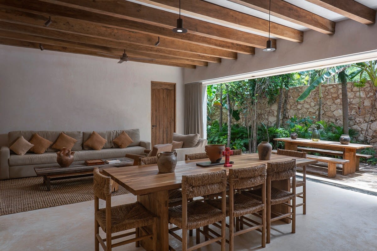 Dining room on the ground floor, with stairs leading to the second floor.