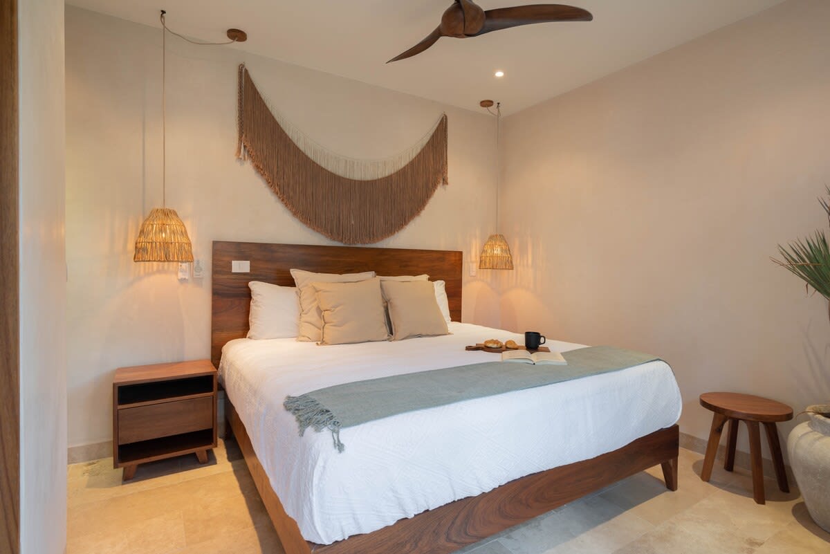 Bedroom with a comfortable king-size bed.