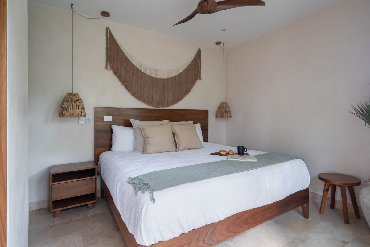 Bedroom with a comfortable king-size bed.