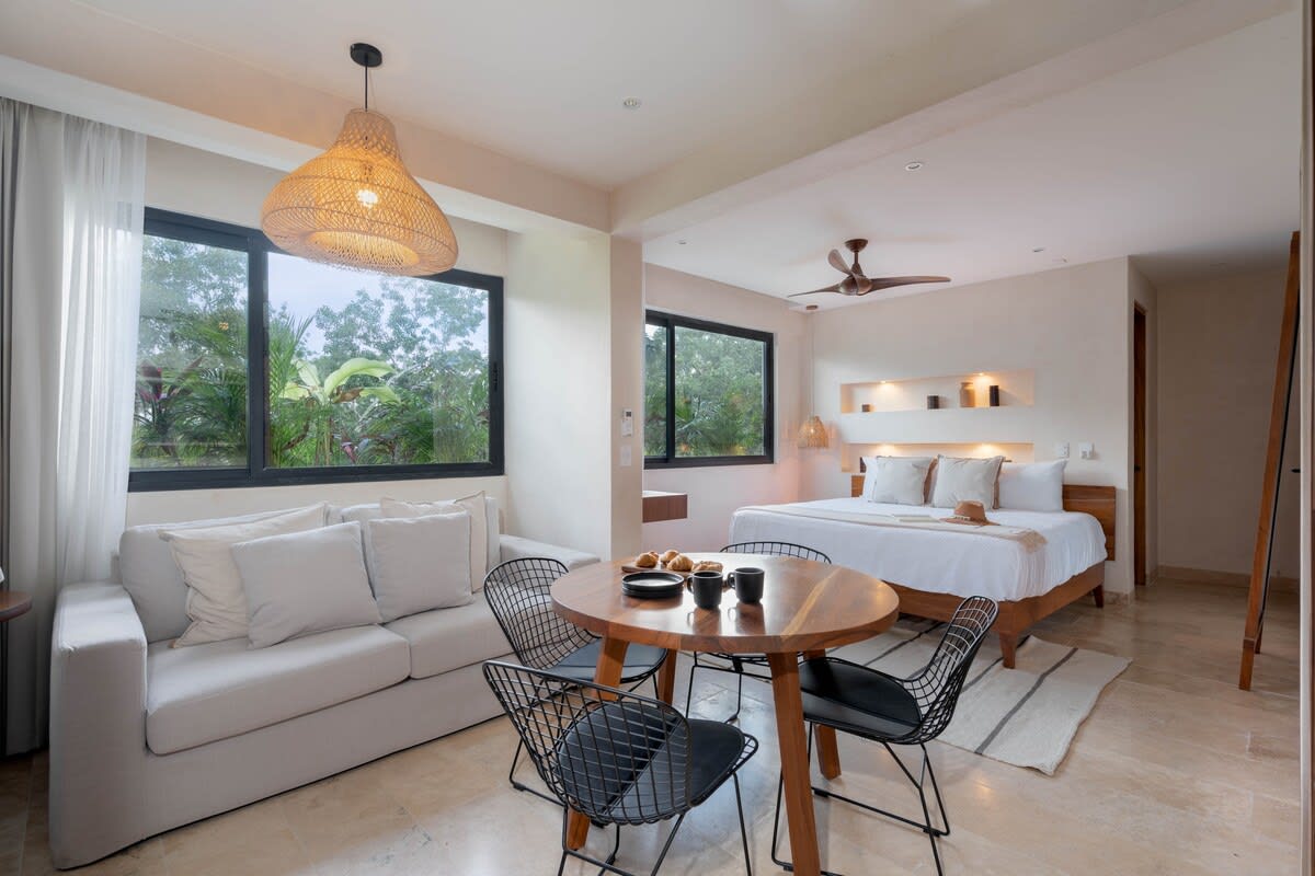 Complete bedroom with its own living and dining area.