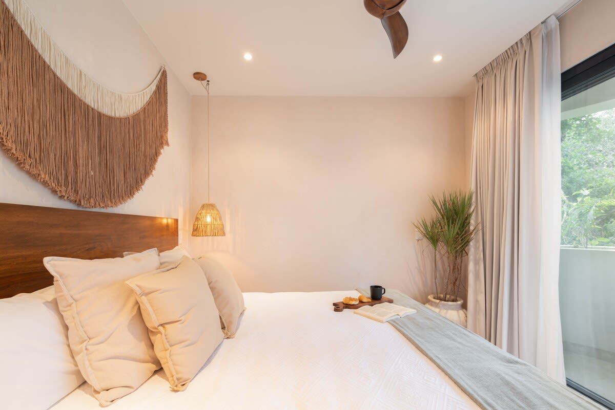 Bedroom with a comfortable king-size bed.