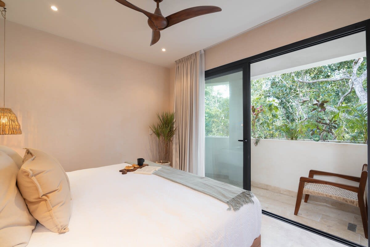 Bedroom with a comfortable king-size bed.