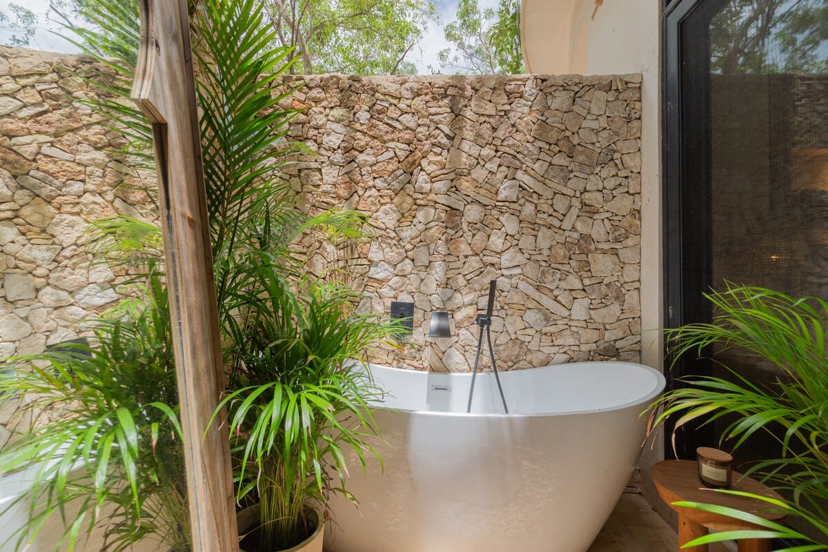 Private terrace with bathtub.