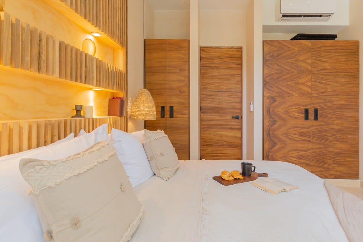 Master bedroom with private patio & outdoor tub.