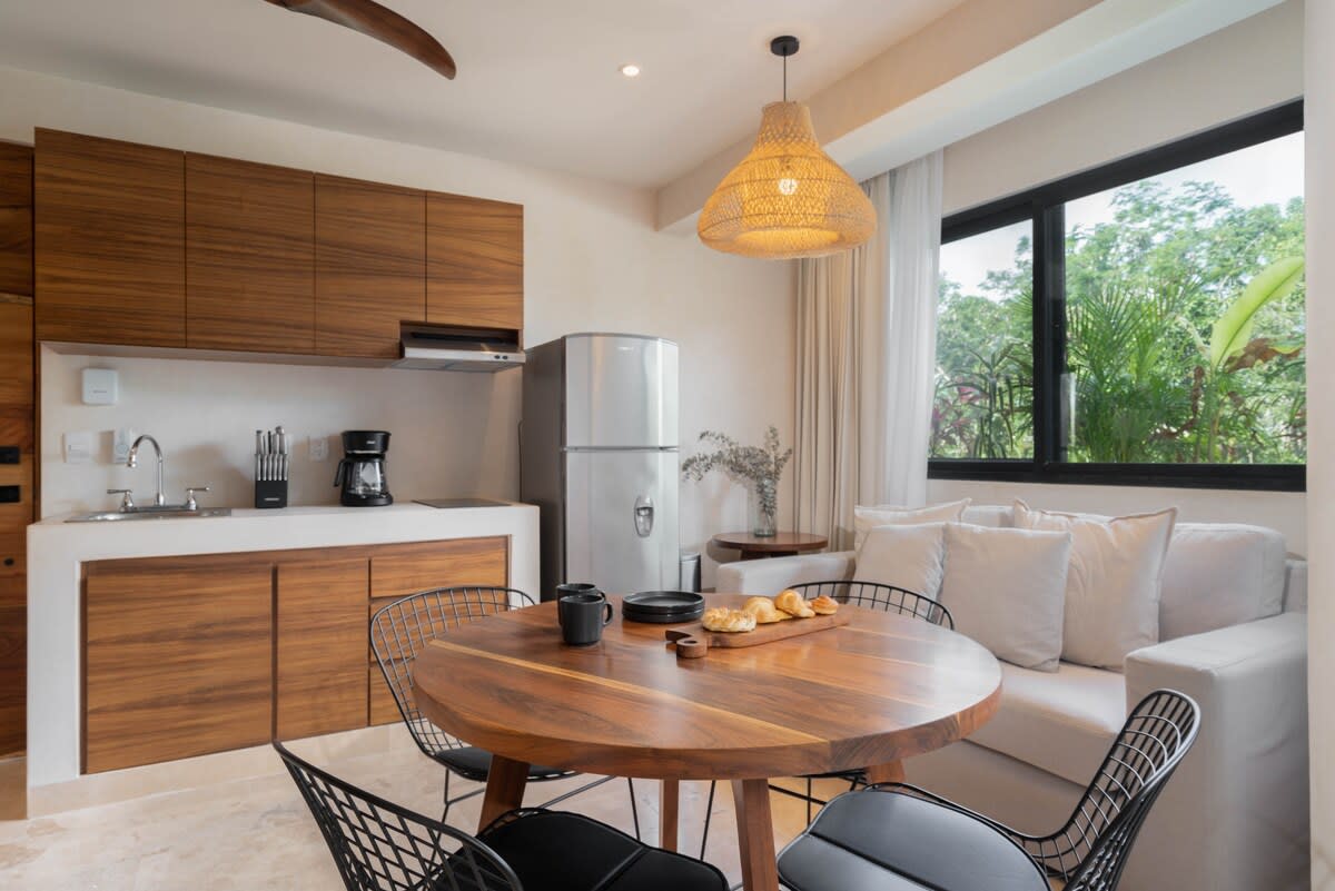 Fully equipped dining room and kitchen on the main floor.