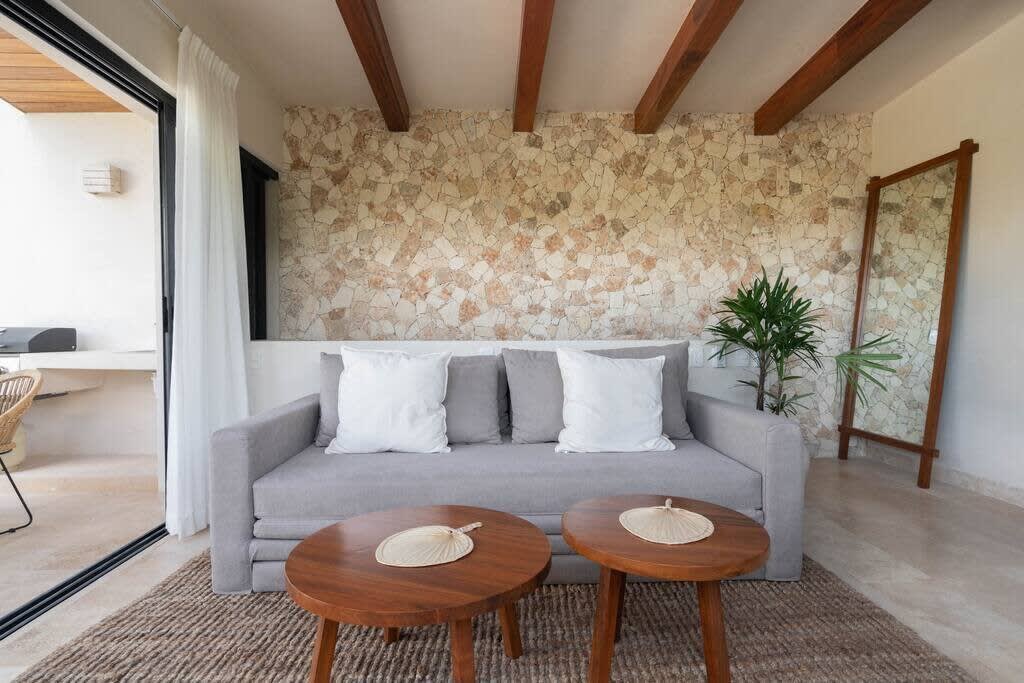 Living room with kitchen and access to rooftop terrace