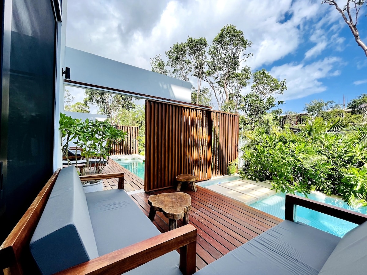 The two magnificent homes are connected by a pool area, allowing guests easy access between them.